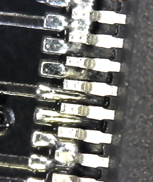 a bunch of badly aligned microcontroller pins