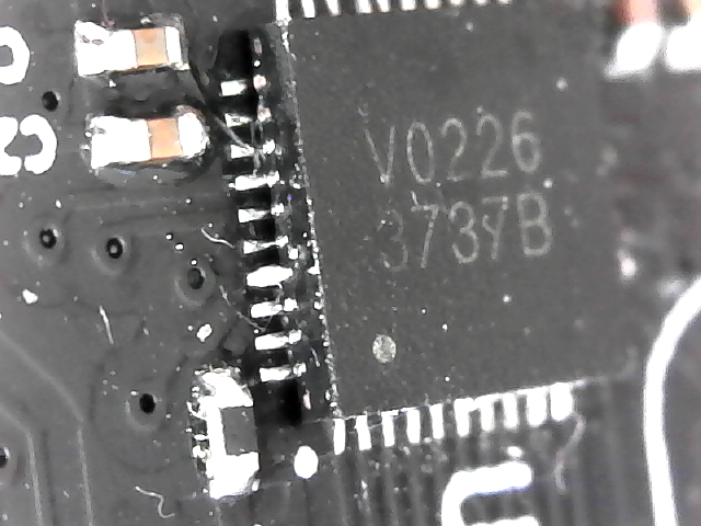 an oblique view of a chip, showing inconsistent soldering