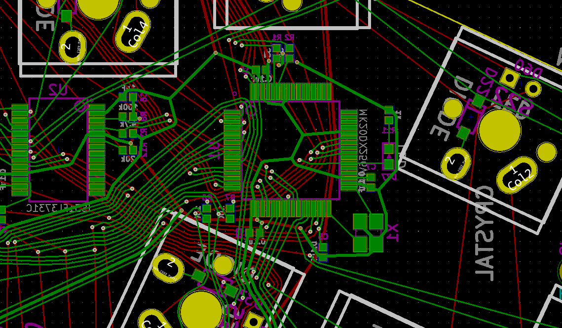 circuit routes in green and red, laid out willy-nilly all over a board